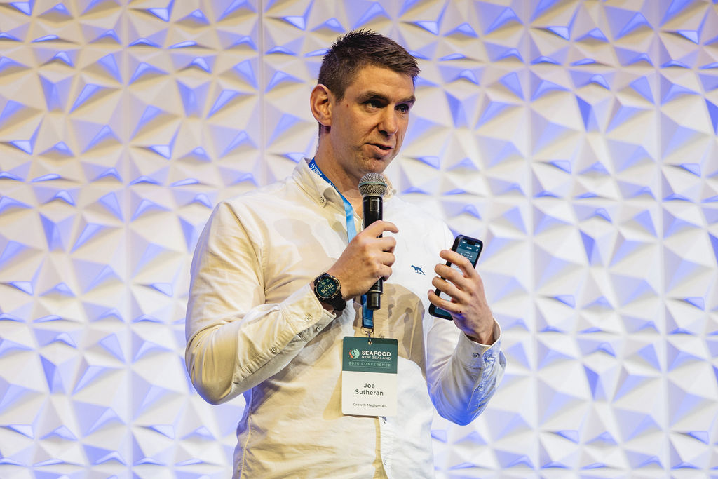 Joe Sutheran presenting on practical AI at the Seafood New Zealand 2026 Conference